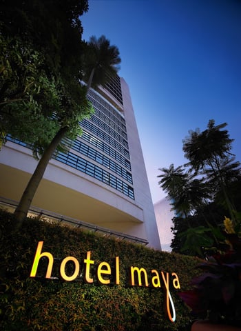 the hotel sign at night
