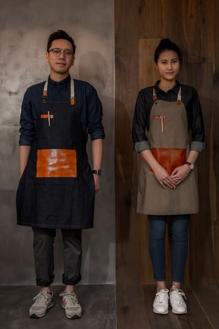 a man and woman wearing aprons and aprons